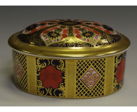 A Royal Crown Derby 1128 pattern oval trinket box and cover, solid band, first quality