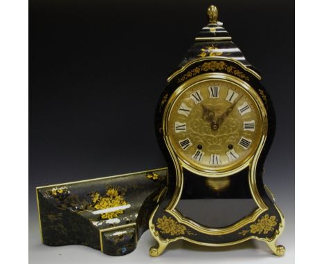 An Eluxa Japanned bracket clock, gilt mounts, enamelled dial, Roman numerals, pinched waist.