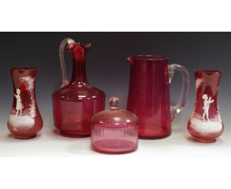 Two Mary Gregory cranberry glass vases; a cranberry glass ewer, pitcher and powder