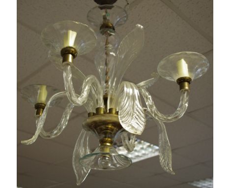 A four branch glass chandelier S scrolled branches interspersed with stylised leaves