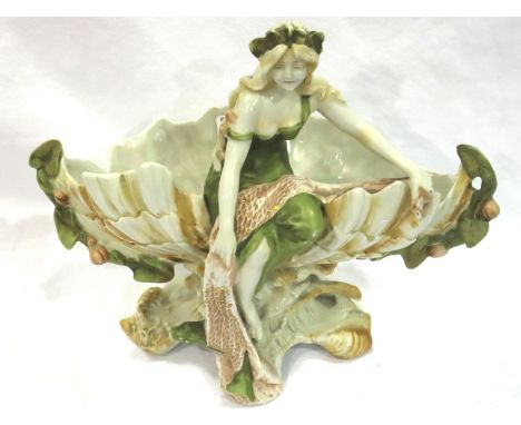Art Nouveau ceramic posy of a lady on a shell, H: 23 cm, small chip to reverse, otherwise good condition. P&amp;P Group 3 (£2
