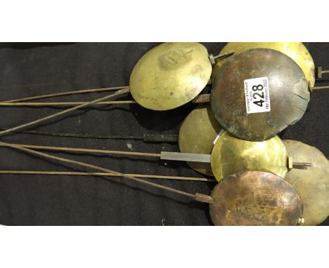 Seven long case clock pendulums, one with feather. Not available for in-house P&amp;P, contact Paul O'Hea at Mailboxes on 019