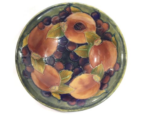Moorcroft shallow circular bowl in the Pomegranate pattern signed to base, D: 16 cm, crazed throughout otherwise no cracks, c