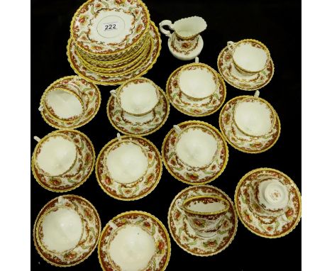 Royal Albert tea service of forty pieces in a floral and gilt pattern, one cup with broken handle otherwise no cracks, chips 