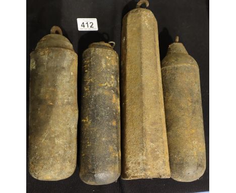 Four long case clock weights. Not available for in-house P&amp;P, contact Paul O'Hea at Mailboxes on 01925 659133 