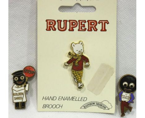 Two Golly pin badges and a Rupert The Bear badge. P&amp;P Group 1 (£14+VAT for the first lot and £1+VAT for subsequent lots) 