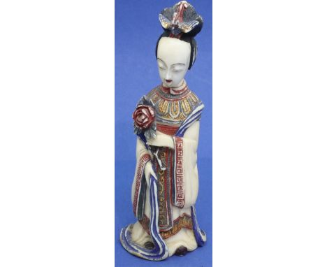 Carved polychrome ivory figurine of a robed lady with a flower, character marks to base, H: 105 mm. P&amp;P Group 1 (£14+VAT 