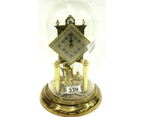 Schatz mechanical anniversary clock set beneath a Perspex dome, H: 29 cm, working at lotting. P&amp;P Group 3 (£25+VAT for th