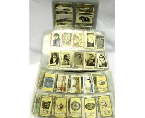 Approximately 1000 cigarette cards in display pouches. P&amp;P Group 2 (£18+VAT for the first lot and £3+VAT for subsequent l