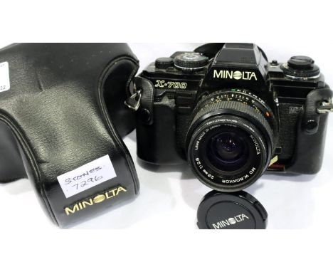 Cased Minolta x-700 with hoya 49mm skylight attached. P&amp;P Group 2 (£18+VAT for the first lot and £3+VAT for subsequent lo