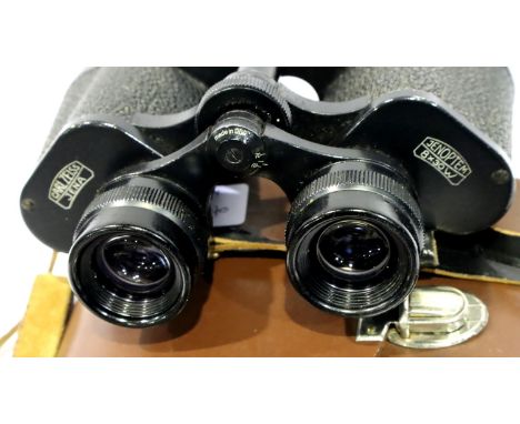 Leather cased Carl Zeiss Jena Jenoptem 8 x 30 binoculars. P&amp;P Group 2 (£18+VAT for the first lot and £3+VAT for subsequen