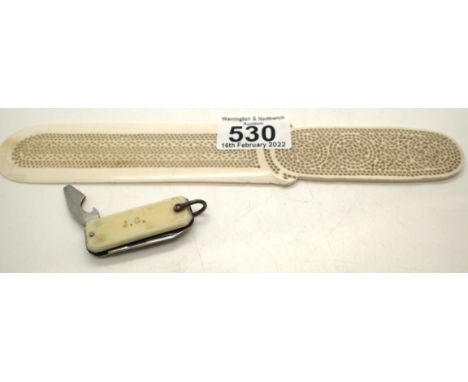 Late 19th/early 20th century reticulated ivory page turner with ivory bound pen knife (2). P&amp;P Group 1 (£14+VAT for the f