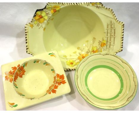 Three Art Deco ceramic bowls including a Clarice Cliff example, largest L: 27 cm, all shows signs of wear otherwise no cracks