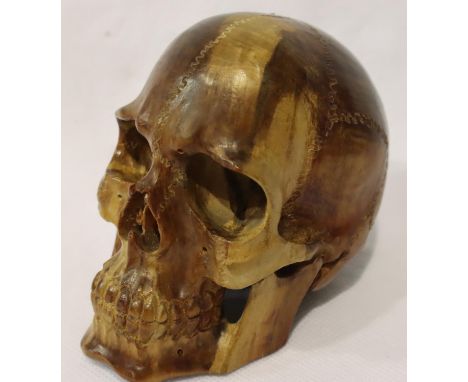 Wooden carved fruitwood skull, H: 80 mm. P&amp;P Group 1 (£14+VAT for the first lot and £1+VAT for subsequent lots) 
