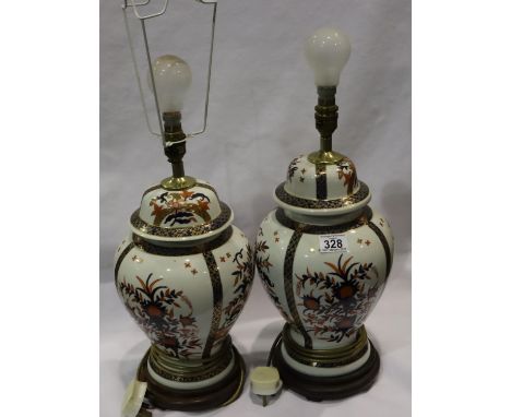 Pair of 20th century covered urn form table lamps, each H: 40 cm. Not available for in-house P&P, contact Paul O'Hea at Mailb