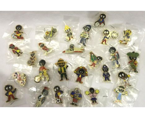Twenty six Golly badges in packets of issue. P&amp;P Group 1 (£14+VAT for the first lot and £1+VAT for subsequent lots) 