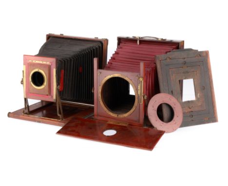 A Pair of Large Plate Mahogany Studio Cameras, comprising an unsigned mahogany and brass 10x12 inch body, some tape has been 