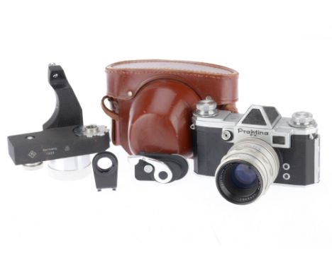 A KW Praktina FX 35mm SLR Camera silver, shutter cocks and works nicely, body G, dust in viewfinder, with a Carl Zeiss Jena B