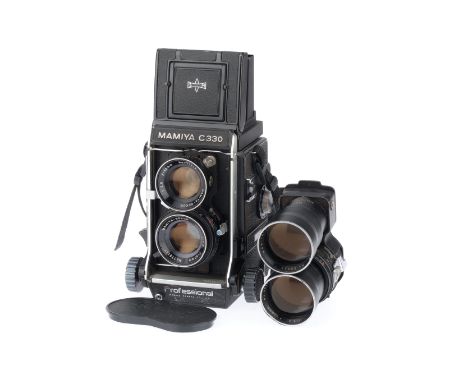 A Mamiya C330 Professional TLR Medium Format Camera, black, body G, focus works, viewfinder clear, with a Mamiya-Sekor f/2.8 