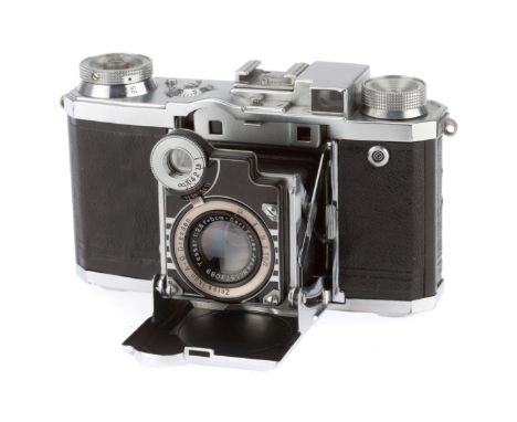 A Zeiss Ikon Super-Nettel II Rangefinder Camera, silver, serial number B22317, body G, shutter works but curtains are slow, r