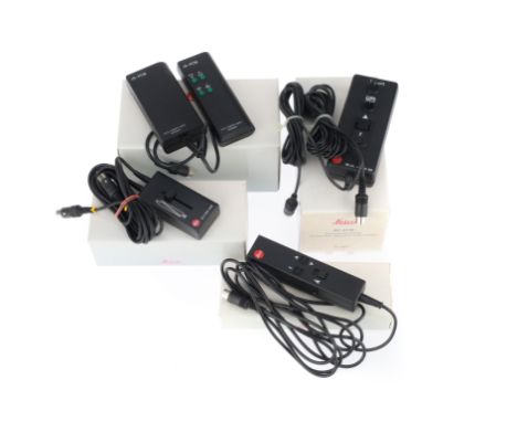 A Selection of Leica Projector Accessories, comprising a 37 939 cable remote with light pointer, a 37 990 infra red remote co
