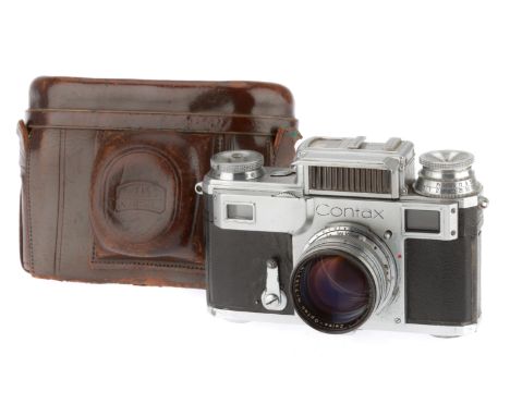 A Zeiss Ikon Contax III Rangefinder Camera, silver, serial number M37561, rangefinder patch works, shutter works but is not a