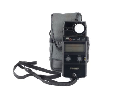 A Minolta Flash Meter IV Light Meter Device, black, body VG, working at time of auction, in maker's case, shows reasonable re