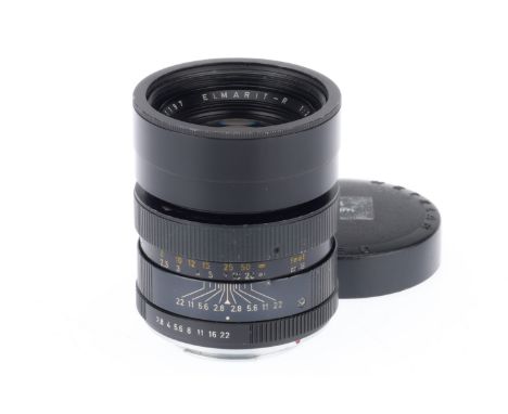 A Leitz Wetzlar Elmarit-R f/2.8 90mm Lens, black, serial number 2171197, barrel G, optics F with internal haze, with front ca