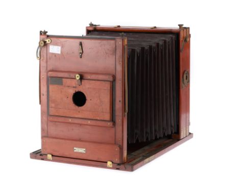 A Sands & Hunter Imperial 10x12 Inch Tailboard Camera, English, of mahogany and brass construction, bellows open and close, e