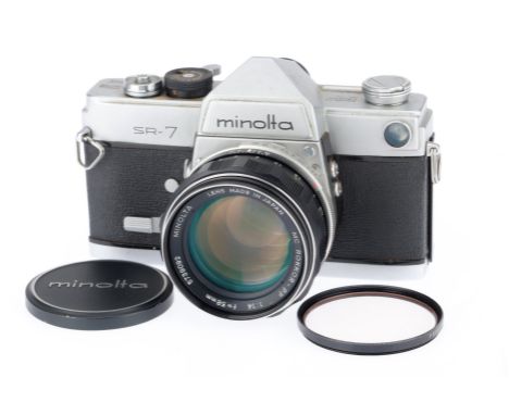 A Minolta SR-7 35mm SLR Camera, silver, serial number 2425744, body F-G, shutter works but sticks at slow speeds, self timer 