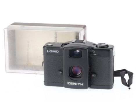 A Lomo LC-A 35mm Compact Camera, black, in F condition, some corrosion to battery chamber, untested,