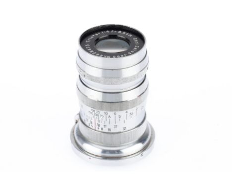 A Carl Zeiss Jena Triotar f/4 8.5cm Lens, chrome, serial number 2428473, barrel G, optics F with internal haze and light fung