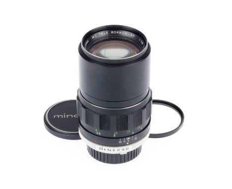 A Minolta MC Tele-Rokkor-PF f/2.8 135mm Camera Lens, black, serial number 1584862, barrel VG, optics G-VG, light dust, very l