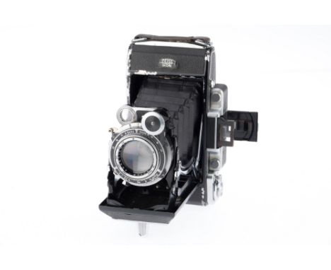 A Zeiss Ikon Super Ikonta 531/2 Medium Format Rangefinder Camera, black &amp; chrome, body F, some heavy wear, shutter workin
