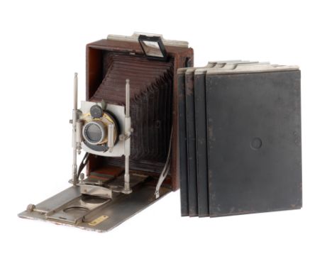 A Houghton Ensign Cameo Folding Plate Camera, brown leather, opens and folds correctly, bellows appears good, not light teste