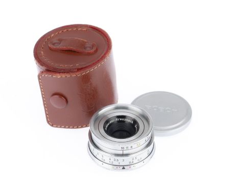 A Schneider-Kreuznach f/3.5 30mm Xenagon Lens, chrome, serial number 8918630, barrel G, optics F-G with peripheral haze, iris