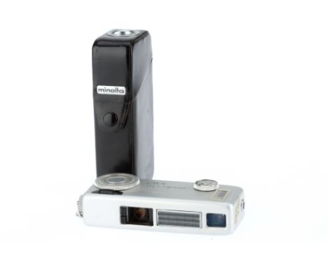 A Minolta 16 MG Sub-Miniature Film Camera, silver, serial number 325115, body G, advance and shutter working, meter responds 