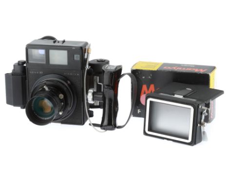 A Mamiya Super 23 Medium Format Rangefinder Camera, black, serial no. A47734, with a Mamiya-Sekor f/3.5 100mm lens, shutter c