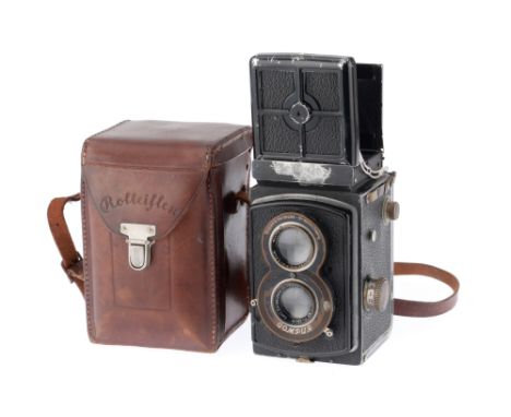A Rollei Rolleiflex Old Standard Medium Format TLR Camera, black, serial number 461641, body F, some paint loss, shutter work