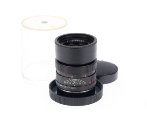 A Leitz Wetzlar Elmarit-R f/2.8 90mm Lens, black, serial number 1965347, barrel G, optics F with internal haze, with front ca