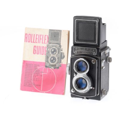 A Rolleiflex 3.5 TLR Camera, black, body G, unusual model, has film wind-on knob, synchro-super shutter with shutter mounted 