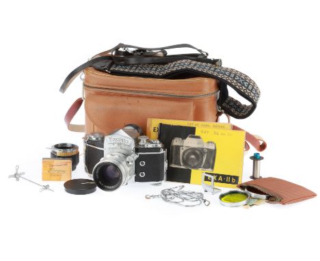 A Ihagee Exakta Varex IIa 35mm SLR Camera, silver, body VG, shutter working, viewfinder clear, with accessory eyepiece, andCa
