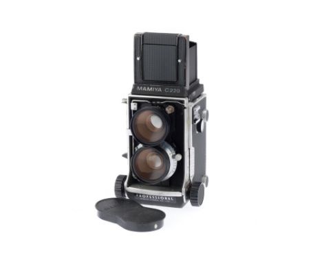 A Mamiya C220 Professional TLR, black, serial number B79652, body F-G, small cosmetic bend to bottom of front standard, shutt