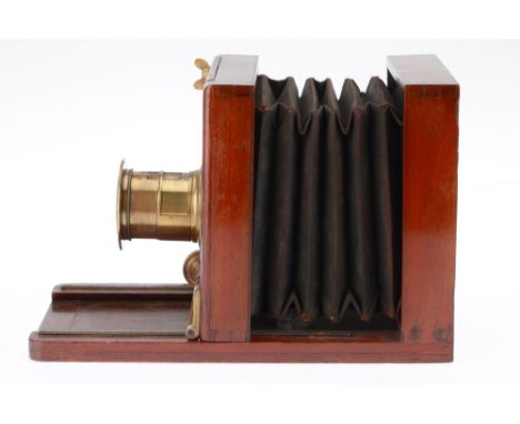An Unsigned Small Studio Camera Body, mahogany and brass, body F, has no back, bellows open but are not light tight, with an 