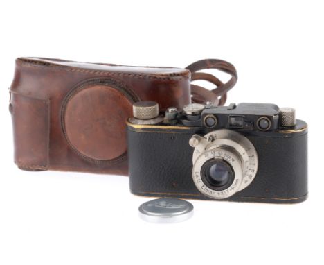 A Leica I Rangefinder Camera, black, serial number 27466, body F-G, heavy brassing from use, rangefinder optics G, shutter cu