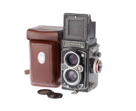 A Rollei Rolleiflex 3.5F Medium Format TLR Camera, black, serial number 1767633, body F-G, shutter works at slow speeds but a