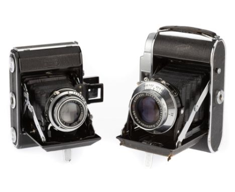 A Pair of German Folding Cameras, comprising a Zeiss Ikon Ikonta 521, black, body G, shutter works, with a Novar f/3.5 7.5cm 