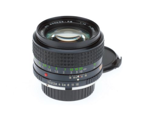 A Minolta MC Rokkor-PG f/1.4 50mm Lens, black, serial number 3218555, barrel G-VG, optics F-G, light dust &amp; haze to the f