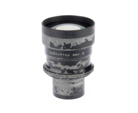 A Dallmeyer f/4.5 12 inch Camera Lens, black, barrel F, paint is heavily worn off, signage just visible, iris operates, optic