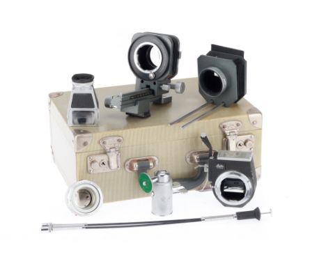 A Leitz Wetzlar Bellows and Attachments, to include a bellows and rail, reflex attachment, eyepiece, and other components, th
